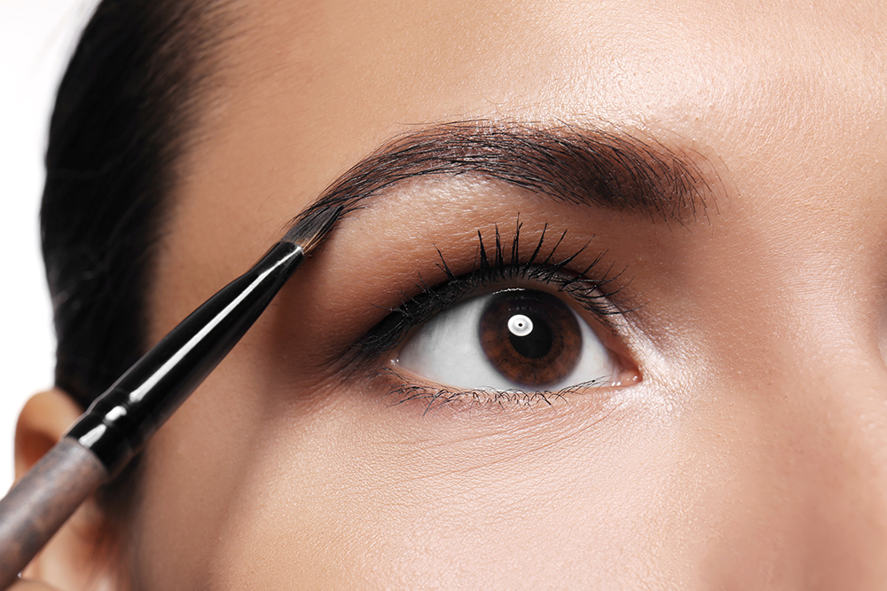 How do you use brow pomade for natural look?